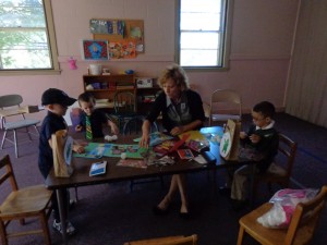 Miss Bonnalee teaches preschoolers Drew, Zach and Ben. 